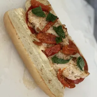 Chicken Mozzarella Caprice Sandwich with fresh basil.  Warm and delicious!