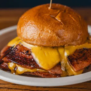 Fried Bologna Sandwich
A Southern favorite with thick-sliced bologna, grilled onions, American cheese, mustard, and mayo.