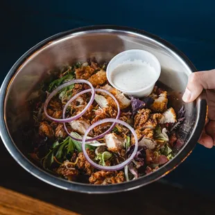 Chicken Tender Salad
Crispy hand-breaded chicken tenders on a bed of fresh salad.