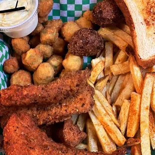 Fish plate, fries, okra, hushpuppies,Texas toast and house made tarter sauce!