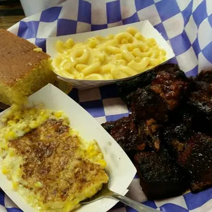 Delicious burnt ends dinner with mac and cheese and corn pudding.