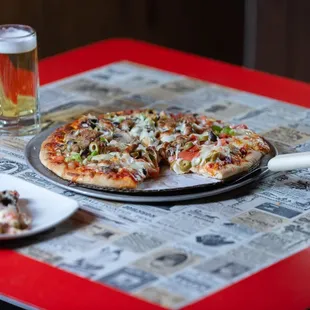 a pizza and a beer