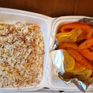 Side rice pilaf with almonds and grilled vegetables