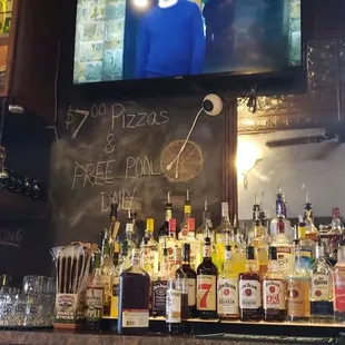 a bar with a chalk board