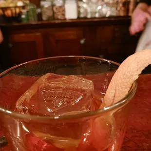 a glass of old fashioned cocktail