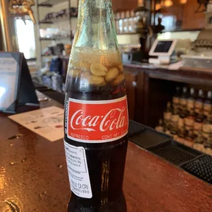 The poor man's snack... coke, peanuts, whiskey in a bottle Tallulah