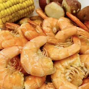 a plate of shrimp and potatoes