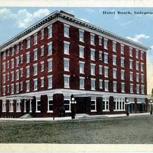 The bar at Booth Hotel Features many architectural renderings of buildings throughout Independence, KS.