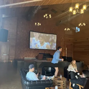 The TV and stage area in the second building. Great place to watch a game