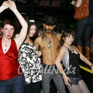  a group of people dancing