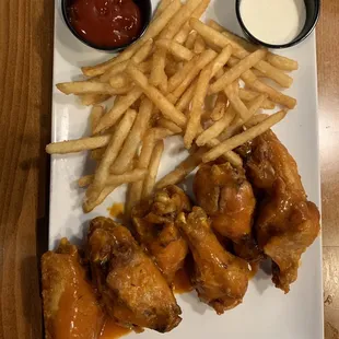 Chicken wings and fries