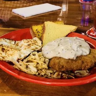 Chicken fried steak and eggs