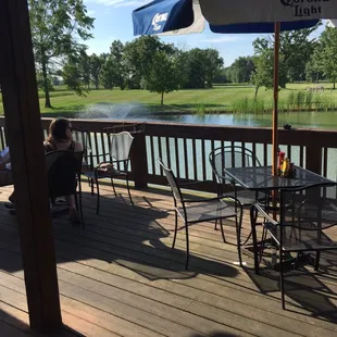 Sitting on the patio, looking at the golf course.