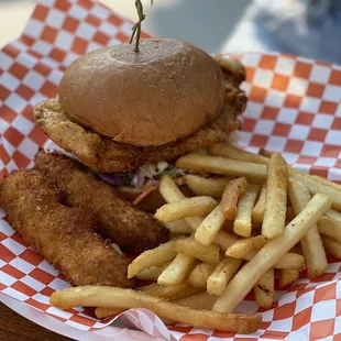 Nearly famous chicken sandwich with classic breading. Fried pickles and fries
