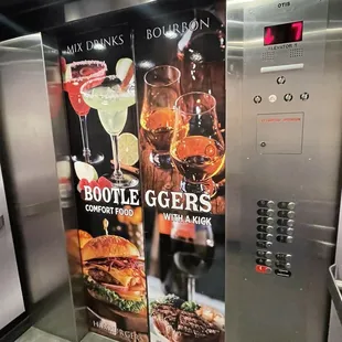 Hotel elevator ad for Bootleggers