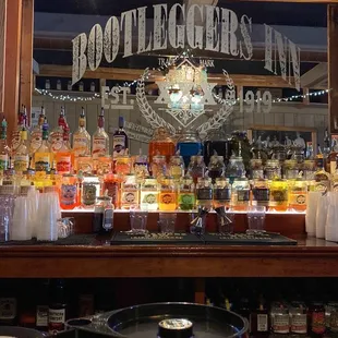 a bar with bottles of liquor