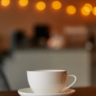 a cup of coffee on a table