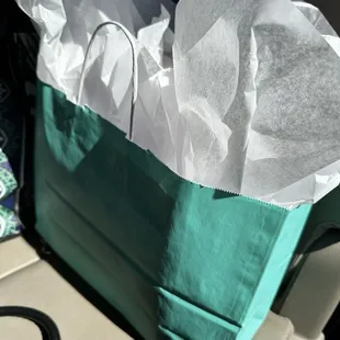 They asked if I wanted a gift bag... had no idea they would gift wrap it like this for me! Above and beyond :)