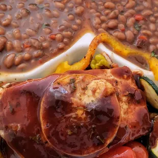 a plate of beans and vegetables