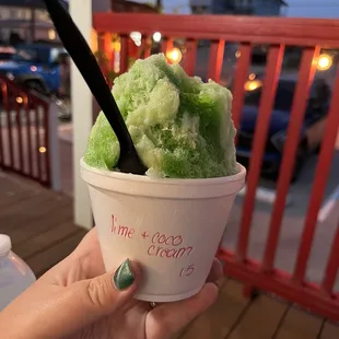 Lime shaved ice w/coconut cream topping.