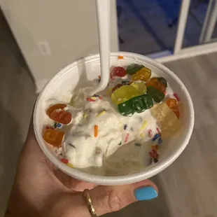 Cookie dough ice cream with rainbow sprinkles and gummy bears