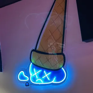 a neon ice cream cone