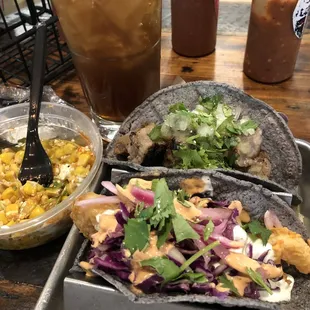 Shrimp fiesta taco (purple onions) and al pastor taco (doesn&apos;t even look like al pastor) with a side of elote