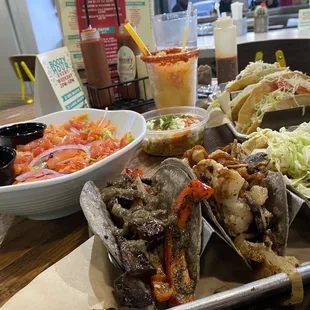 Vegan/vegetarian fancy tacos with some regular crispy tacos.