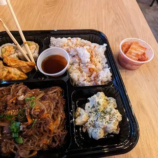 Bulgogi bento box with glass noodles added. Side of kimchi