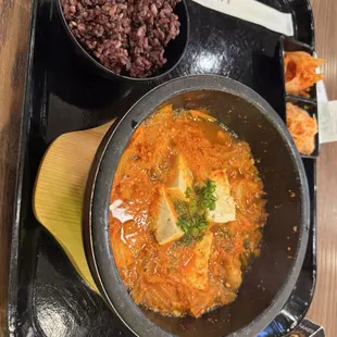 Kimchi soup with purple rice and your choice of two  side picked vegetables
