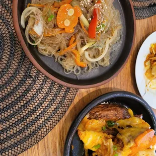 Jap chae and fries with cheese and kimchi