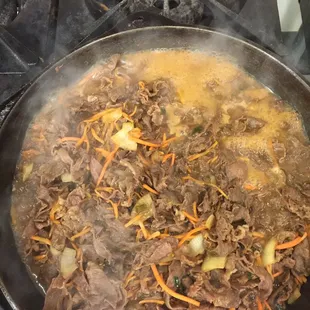 Letting the beef simmer in our home made marinade