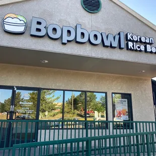 the front entrance of a restaurant