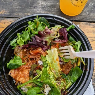 All salad and rice with hardly any tofu in the sesame tofu bowl.