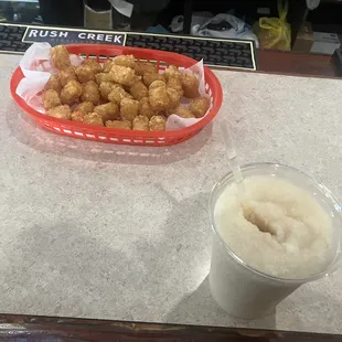 Apple Pumpkin Spice Moonshine Slushie And Tater Tots