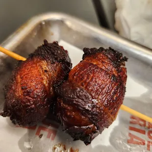 Dates wrapped in bacon