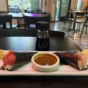 Tune hand roll. Yellowtail scallion hand roll.