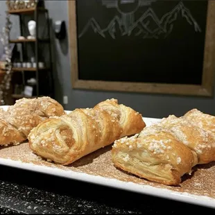 three pastries on a plate