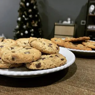 a plate of chocolate chip cookies
