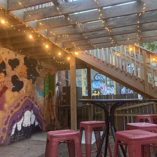 a patio with string lights