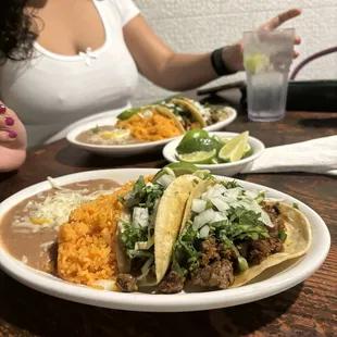 2 taco meal with rice and beans
