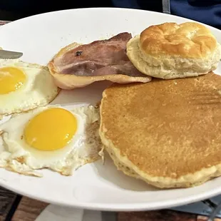 Cattleman&apos;s with pancakes, country ham and over easy.