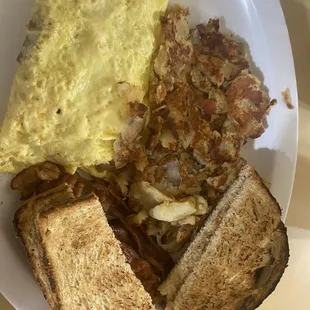 Ham and Cheese Omlette, Fried Potatoes, Toast and Bacon