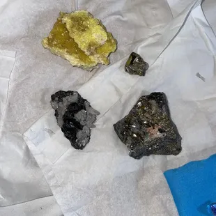 Sulfur, pyrite, sphalerite+pyrite+quarts combo, and a sphalerite+quarts combo