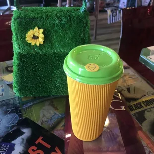 Hot chocolate in a sustainable to-go cup. They also added a cute smiley sticker!