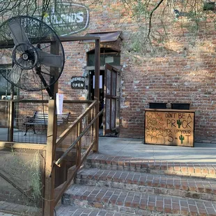 the entrance to a brick building