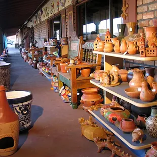 Mexican garden pottery including terracotta and Talavera.