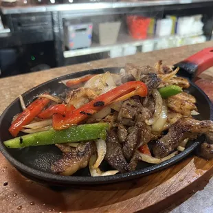 beef and peppers in a skillet