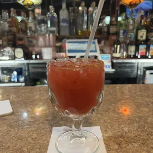 a drink in a glass with a straw