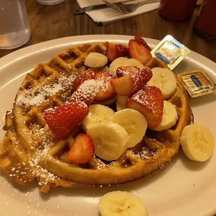 Belgian waffle with strawberries and bananas